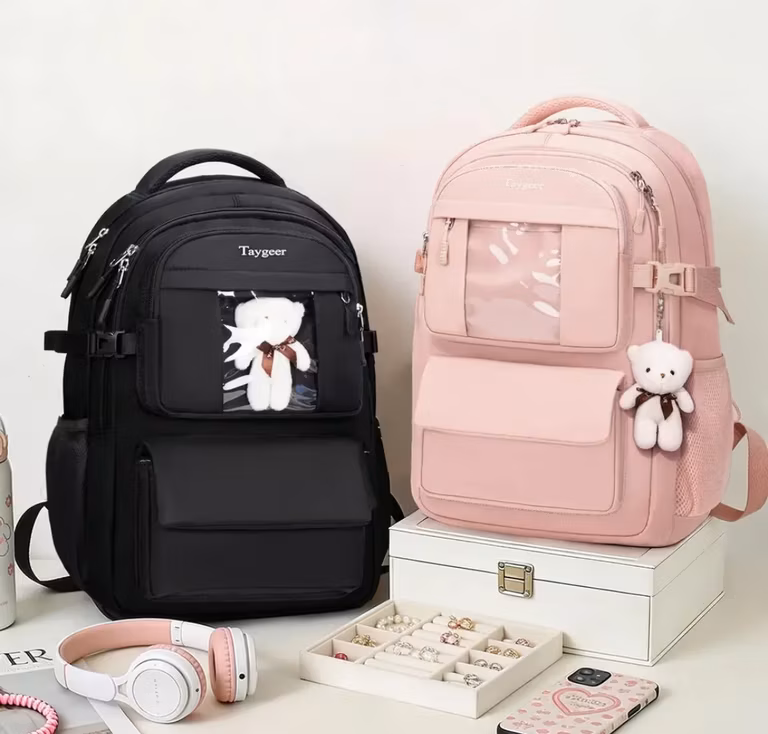 Mercado Libre: Mochila Escolar Taygeer 41.5×30.5×17cm Color Negro y Rosa